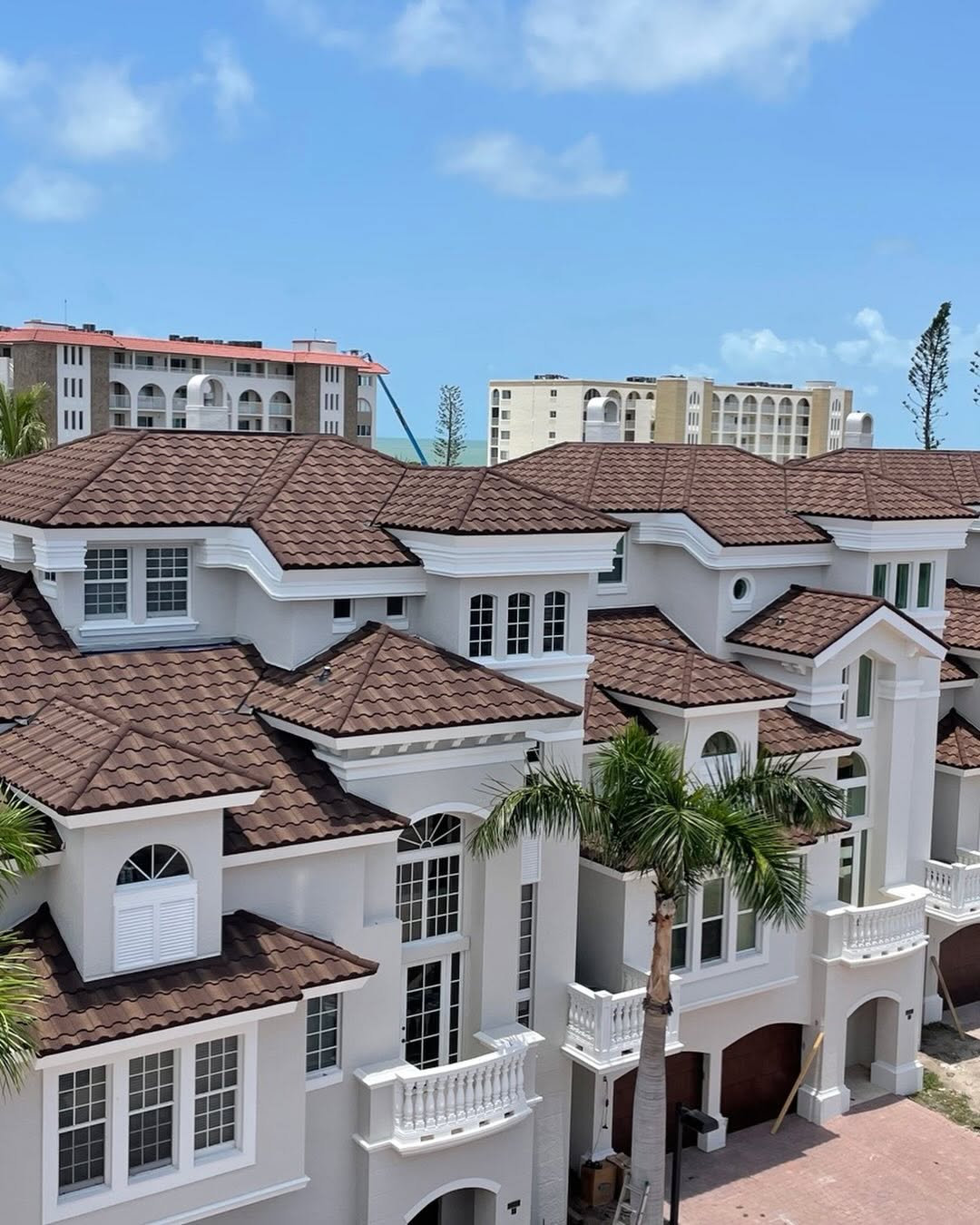 Luxury multi-level tile roof — coastal Florida mansion